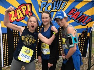 Students posing after Superhero Run